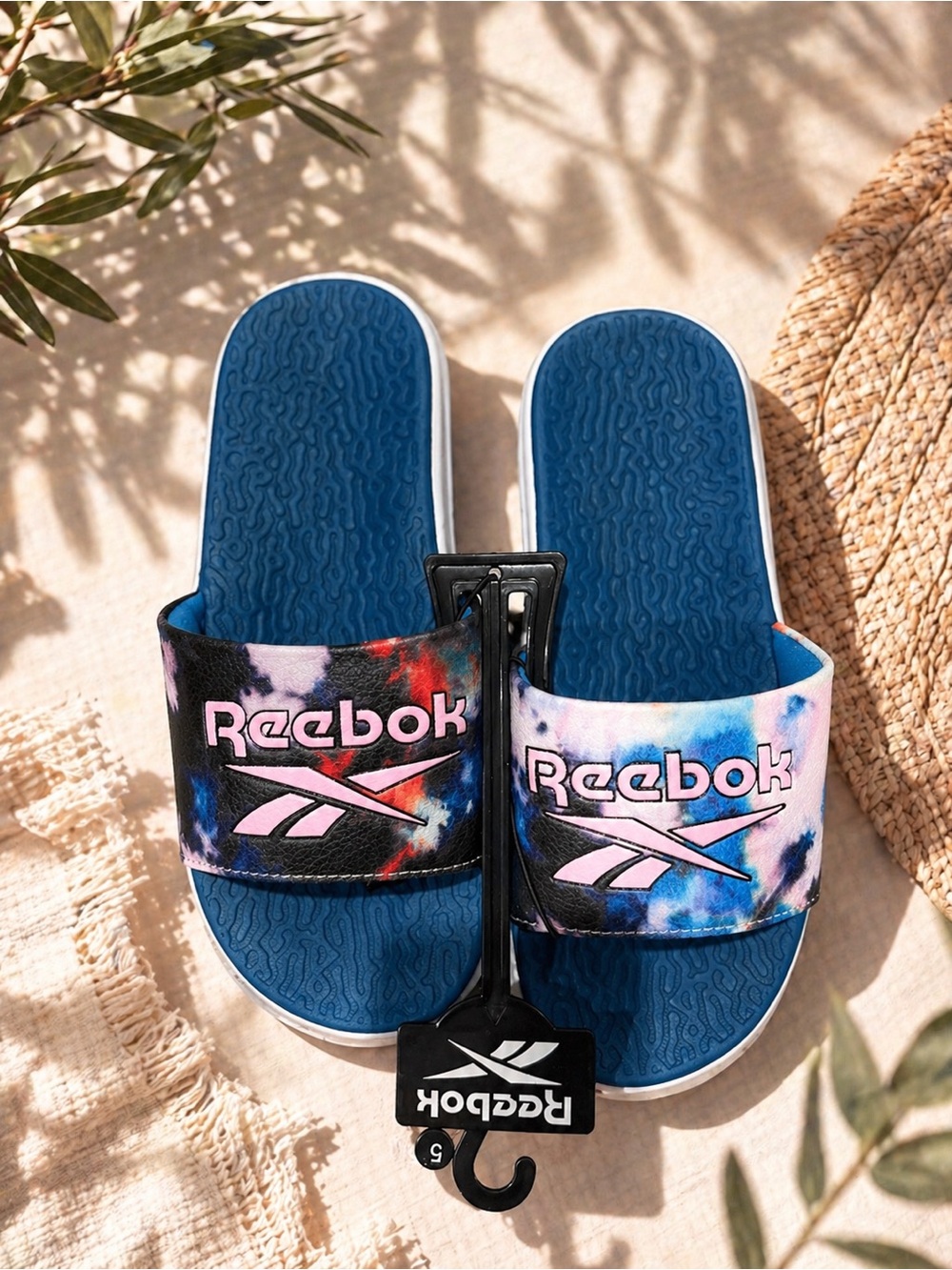 Brand new with tags Reebok slide sandals in fun colorful tie-dye design.